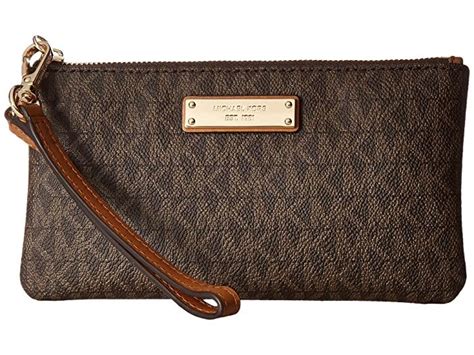 brown large michael kors wristlet|Michael Kors wristlet wallet black.